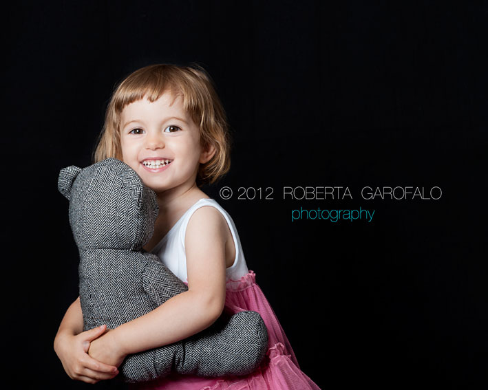 Fotografia bambina con orsacchiotto