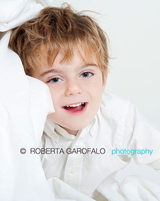 Sessione fotografica per bambini, Roma. Foto di bambino che sorride. Roberta Garofalo, Fotografo professionista di Maternità, Neonati, Bambini e Famiglie, Roma